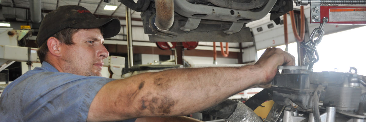 Mechanic working on a truck at Bascom Truck and Auto